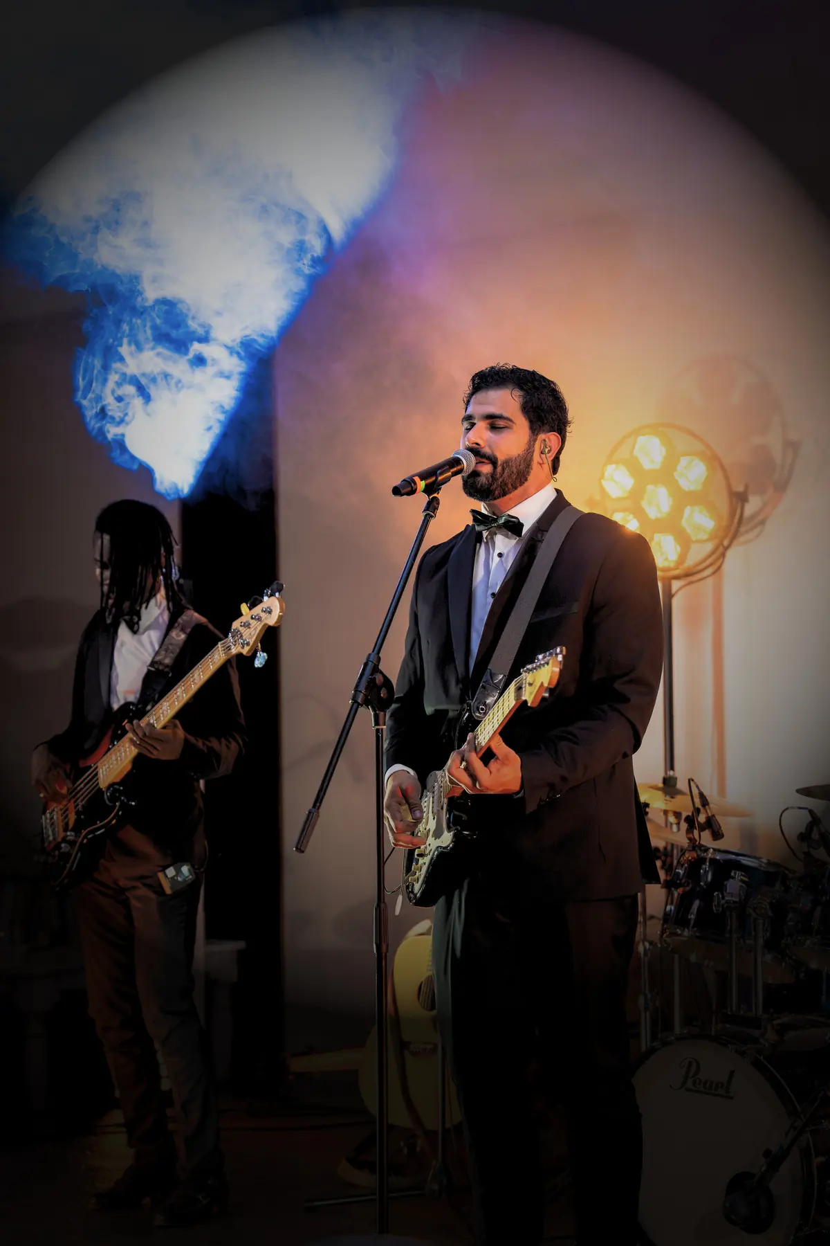 Lead singer and guitarist performing on stage